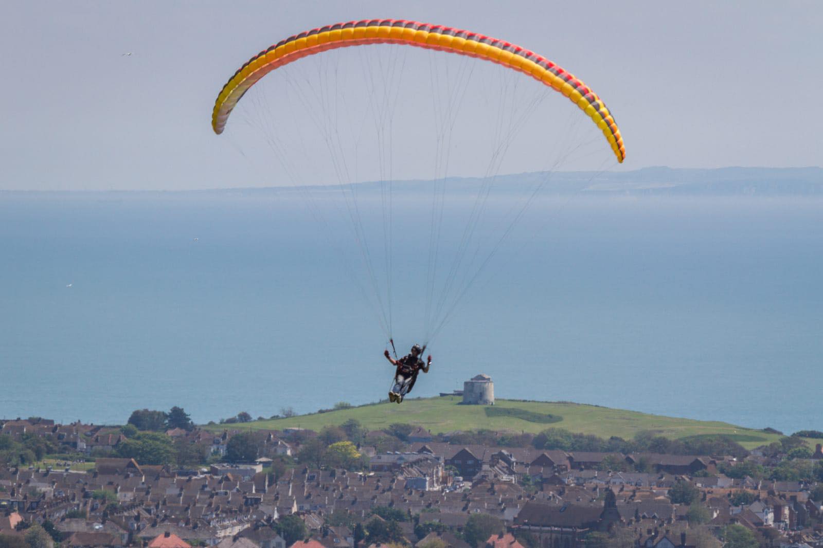 Paragliders over Martello Tower